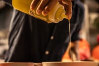 Behind the scenes — Our Secret chef crafts a signature Vietnamese fusion dish with passion and precision.