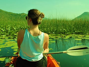 Spend your day gliding through refreshing waters of Lake Skadar.