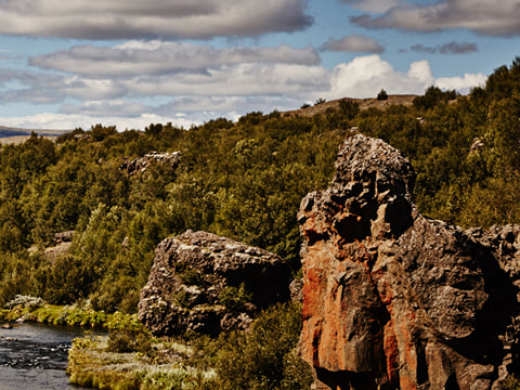 Colorful rock formations at Gjáin