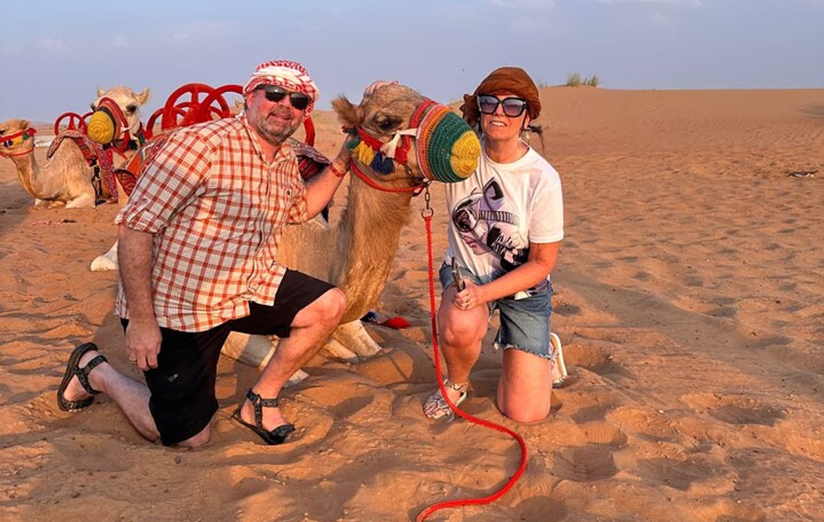 Exclusive Desert Safari Camel Ride Sandboard & Buffet BBQ Dinner