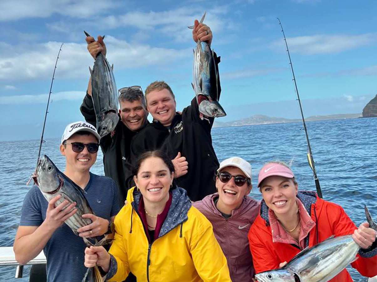 Cast lines together and savor the camaraderie of a day on the bay.