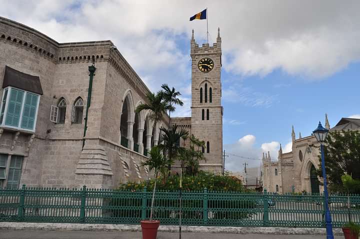 Parliament Buildings with the Barbados flag raised, a significant sight on our guided history walking tour in Bridgetown.
