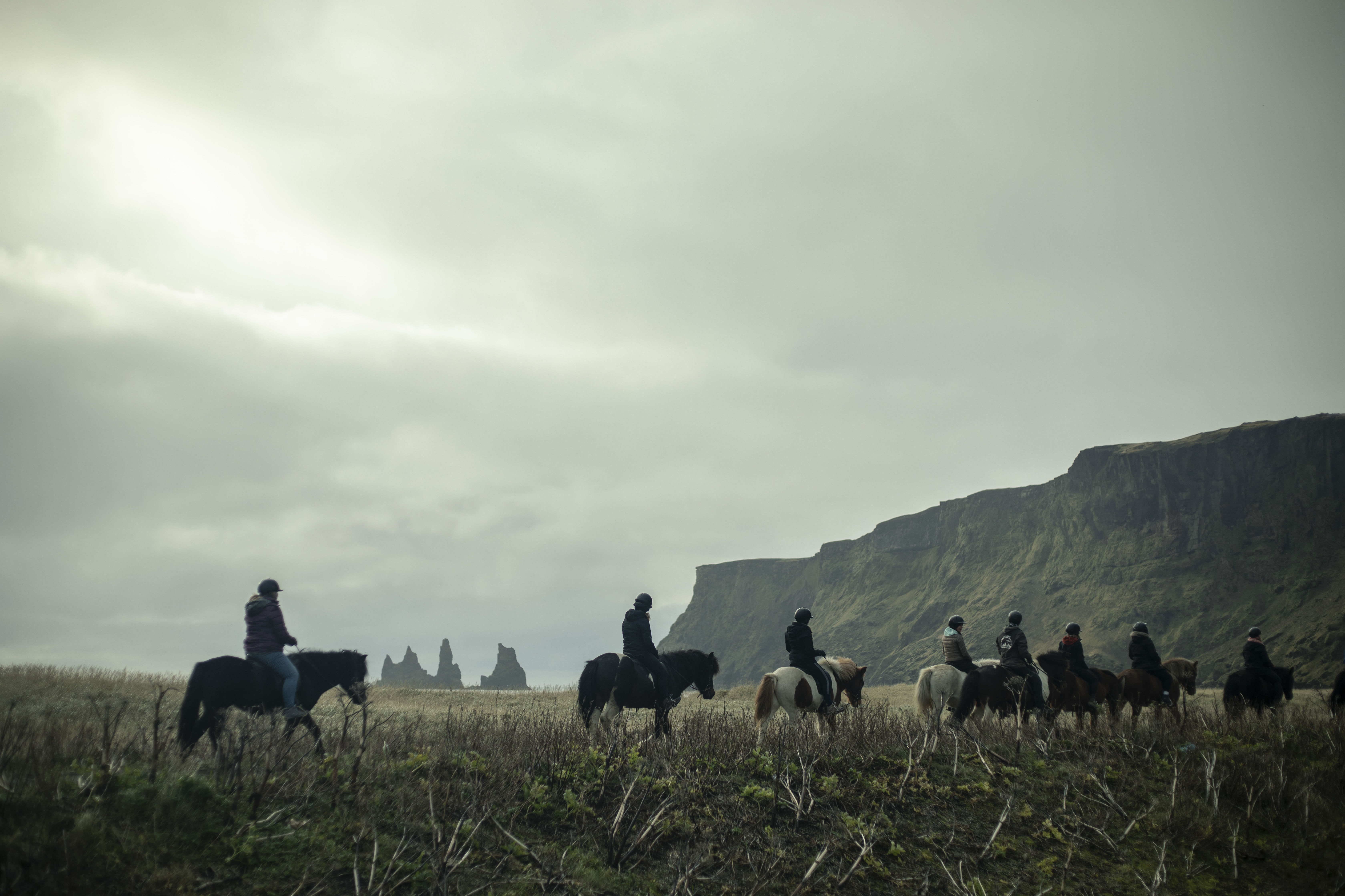 Horse riders enjoying the Icelandic horse near Reynisdrangar sea-stacks