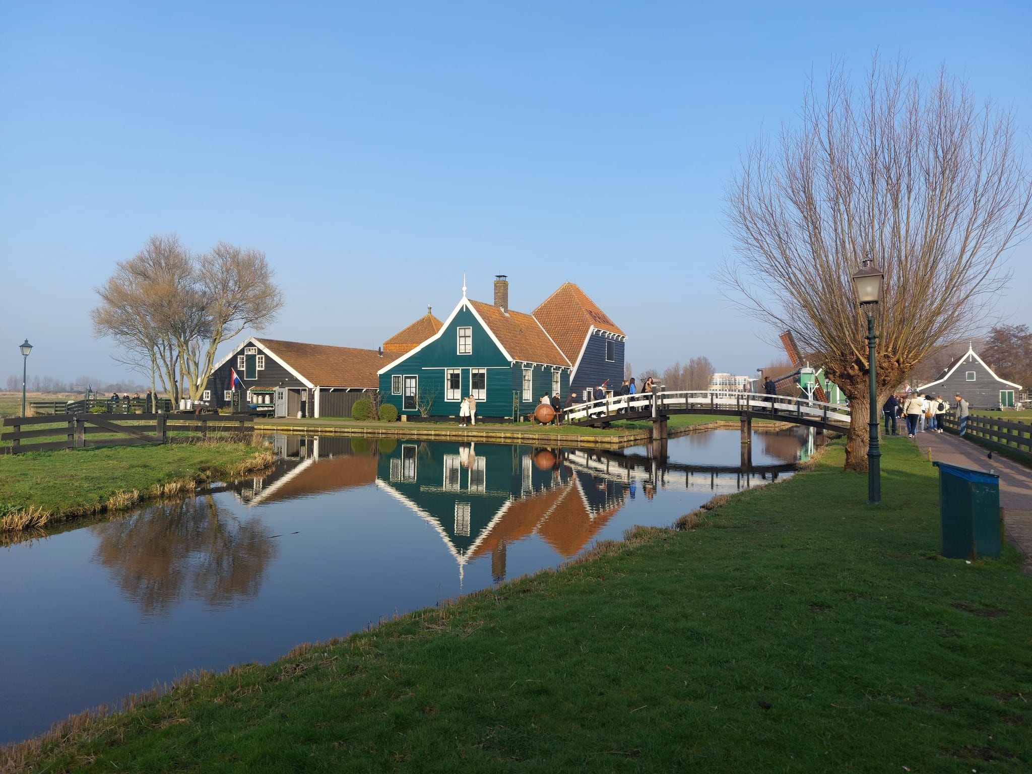 Dutch countryside at Zaanse Schans with canal reflections and traditional houses near Amsterdam