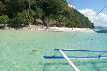 Portbarton island hopping tour with transport fr puerto princesa