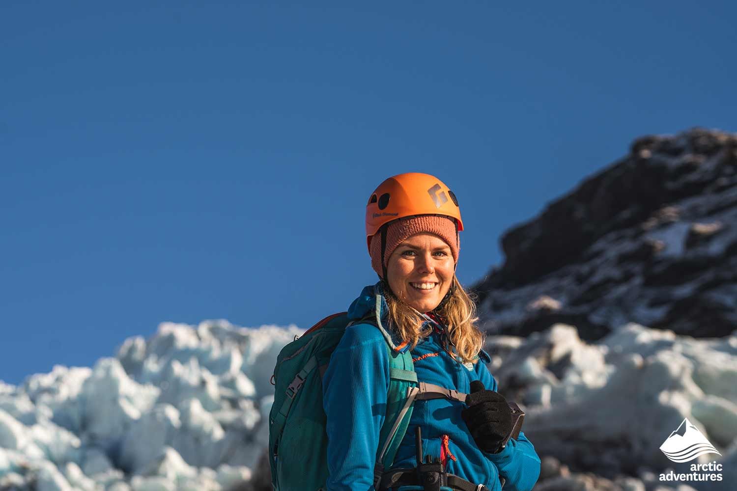 Big smiles for a hiker during Glacier hike Iceland