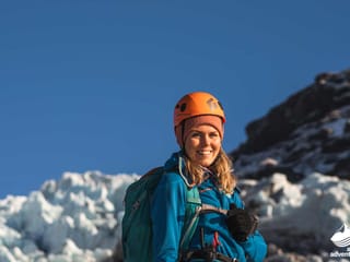 Big smiles for a hiker during Glacier hike Iceland