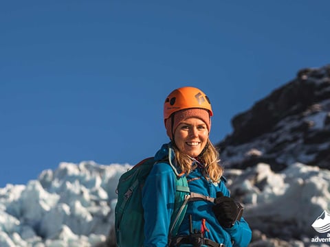 Big smiles for a hiker during Glacier hike Iceland