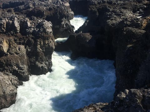 Barnafoss waterfall with high level of water