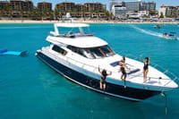 Trade the beach for the bridge: Captain your own adventure with premium service on a private Cabo yacht charter!