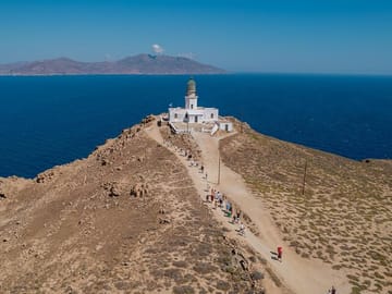 Breathtaking views from Armenistis Lighthouse – a must-see stop on your Mykonos shore excursion. Capture the essence of the Aegean with sweeping sea views and iconic Cycladic charm.