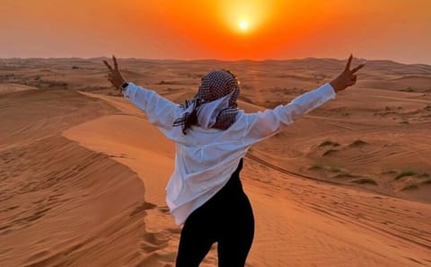 Red Dunes Desert Safari with Camel Riding and BBQ in Dubai