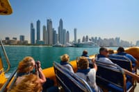 "A top view of the Big Bus as it winds through Dubai's streets, providing a unique and convenient way to sightsee