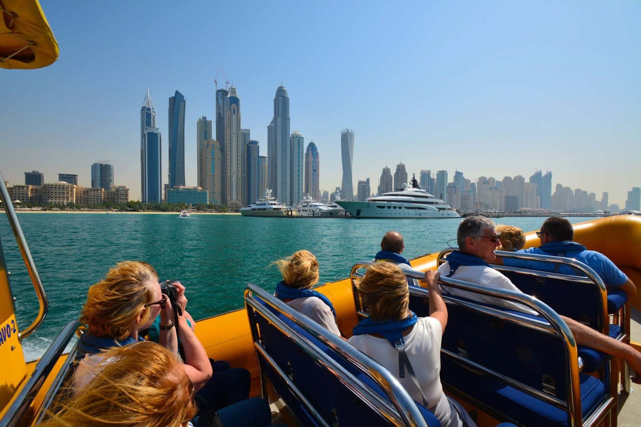 "A top view of the Big Bus as it winds through Dubai's streets, providing a unique and convenient way to sightsee