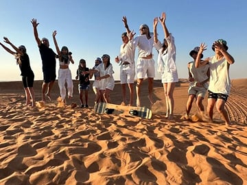 Dubai Red Dune Desert Safari with Camel Ride & BBQ Dinner
