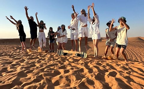 Dubai Red Dune Desert Safari with Camel Ride & BBQ Dinner