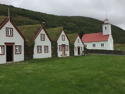 Close-up view of turf-covered roofs and traditional architecture at Laufás