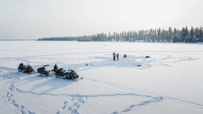 Ice Fishing and Snowmobile Safari Combo in Lapland