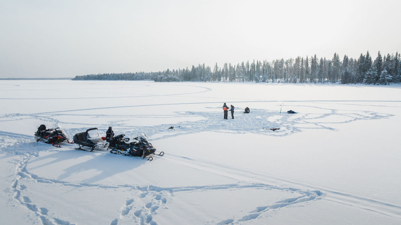 Ice Fishing and Snowmobile Safari Combo in Lapland 6