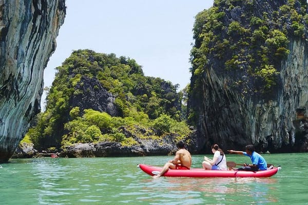 Phang Nga Bay Adventure: Canoe & Speedboat Tour with Lunch