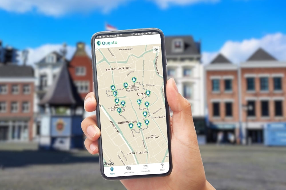 Phone showing the Qugato app interface of the Den Bosch City Detective game at Markt.