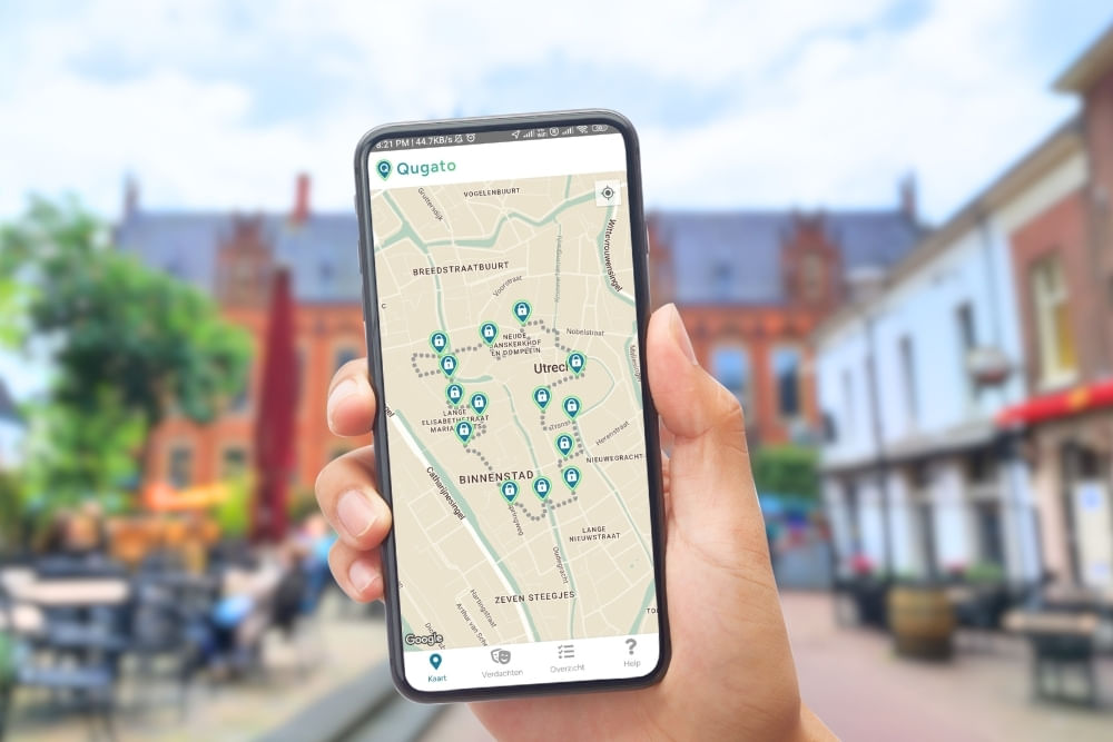 Phone showing the Qugato app interface of the Arnhem City Detective game.
