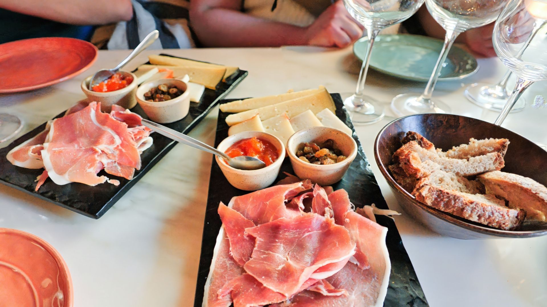 Portuguese cured meats, cheese, and spreads served with bread during a wine tasting
