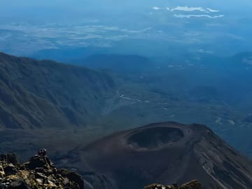 Stunning aerial view of the Mount Meru ash cone and crater.