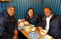 Guests enjoying a variety of local food items at the Seabaron