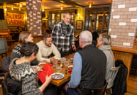 A group of guests enjoying the atmosphere in the restaurant. 