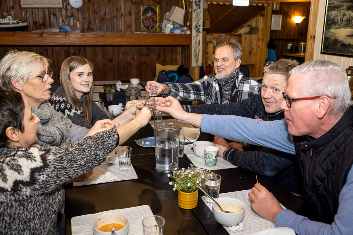 A group saying skál or cheers after a great private Reykjavik Food Tour