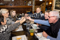 A group saying skál or cheers after a great private Reykjavik Food Tour