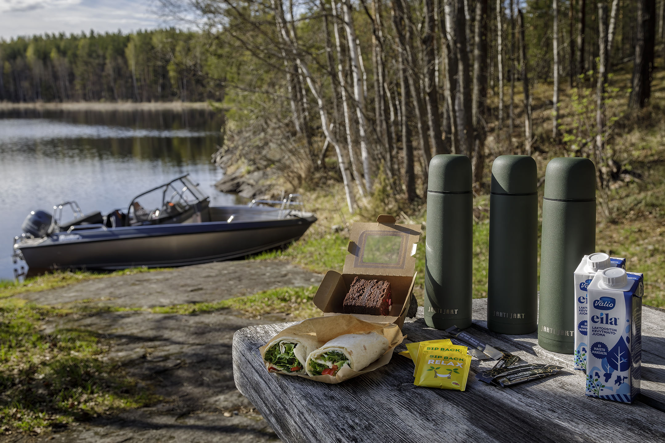 Sandwiches and hot drinks on a picnic