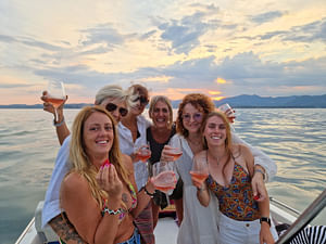 Private boat tour with wine and fish aperitif from Garda