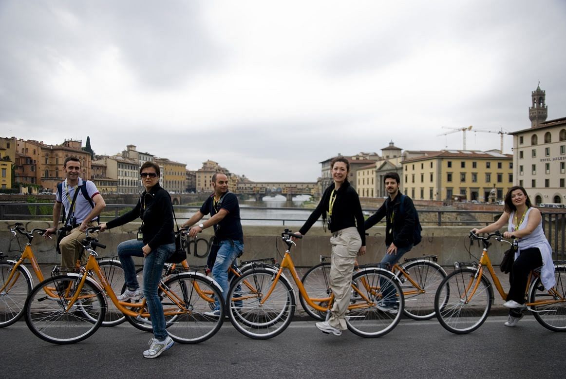 Customers riding their bikes in Florence