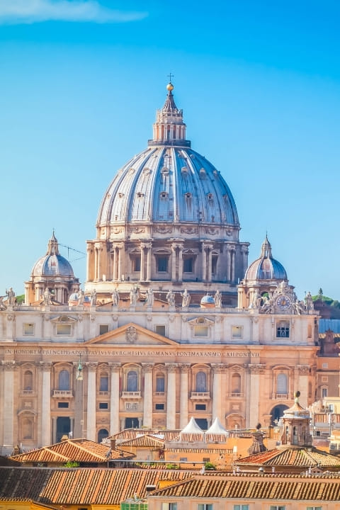 Look up at Michelangelo’s dome glowing over the Vatican, an iconic skyline moment you’ll never forget.