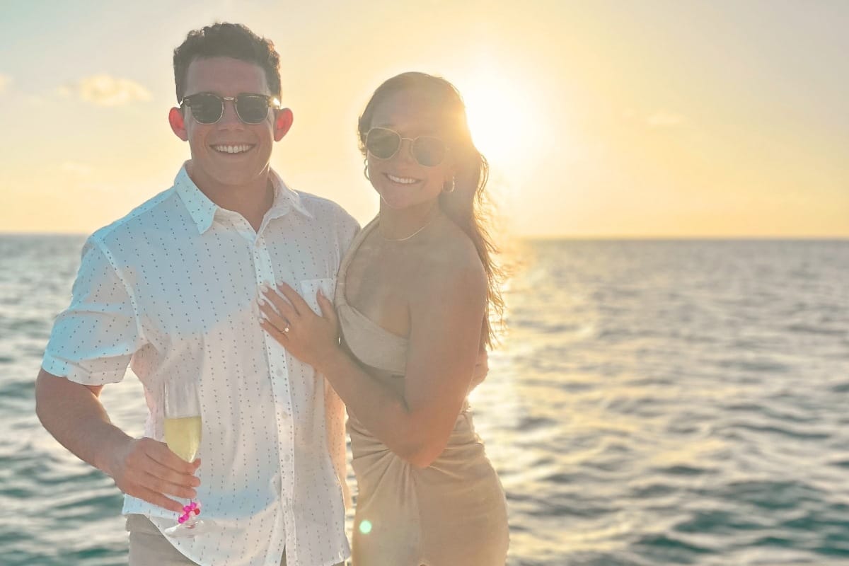 Romantic couple enjoying private sunset cruise in Curacao with Maxie Sailing
