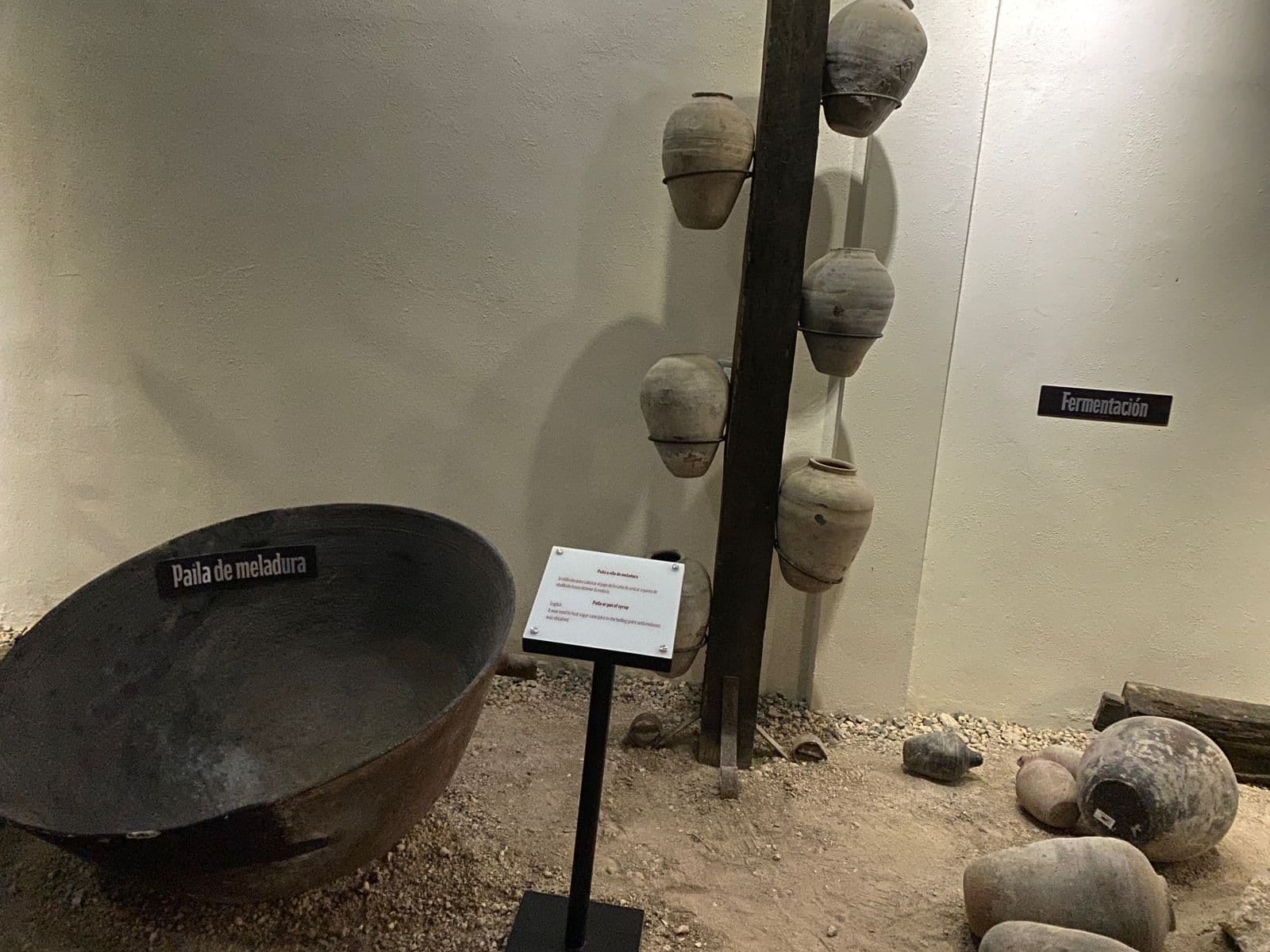 Museum area with old pieces related to the fermentation and traditional production of rum in the Ron Barceló Historical Center.