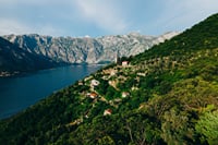 Panoramic view of Gornji Stoliv, a traditional hillside village overlooking the UNESCO-listed Bay of Kotor.