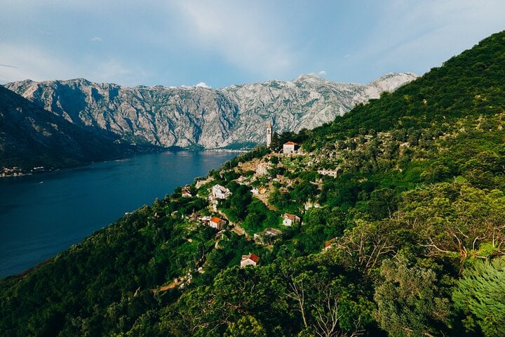 Panoramic view of Gornji Stoliv, a traditional hillside village overlooking the UNESCO-listed Bay of Kotor.