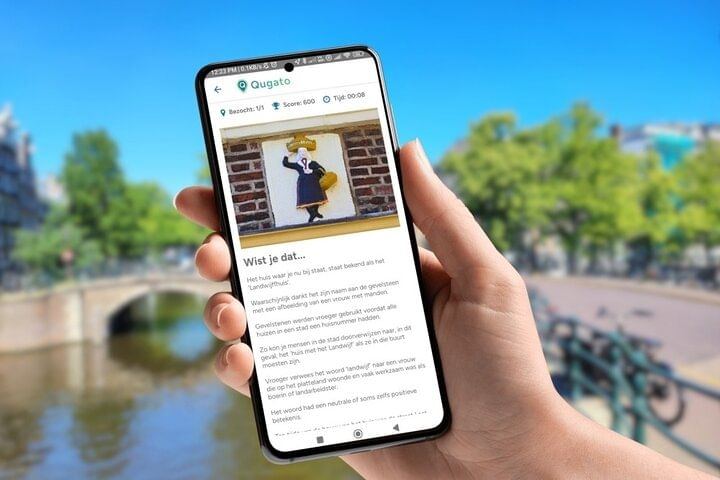 Phone showing app interface with fact of Amsterdam city game