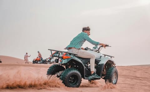 Dubai Quad Bike Safari with Camel Ride and Scenic Dune Photo Stop