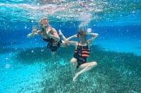 Sail privately past the Cancun skyline to the best spots for spectacular snorkeling aboard your exclusive Catamaran!