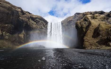 Skógarfoss Waterfall on Soath Coast of Iceland, Rainbow