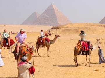 Camel Riding by the Pyramids