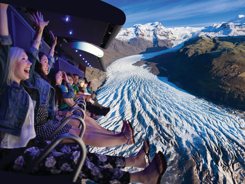 Guests enjoying FlyOver Iceland, a virtual flight attraction that takes visitors across Iceland’s glaciers, volcanoes, waterfalls and coastl