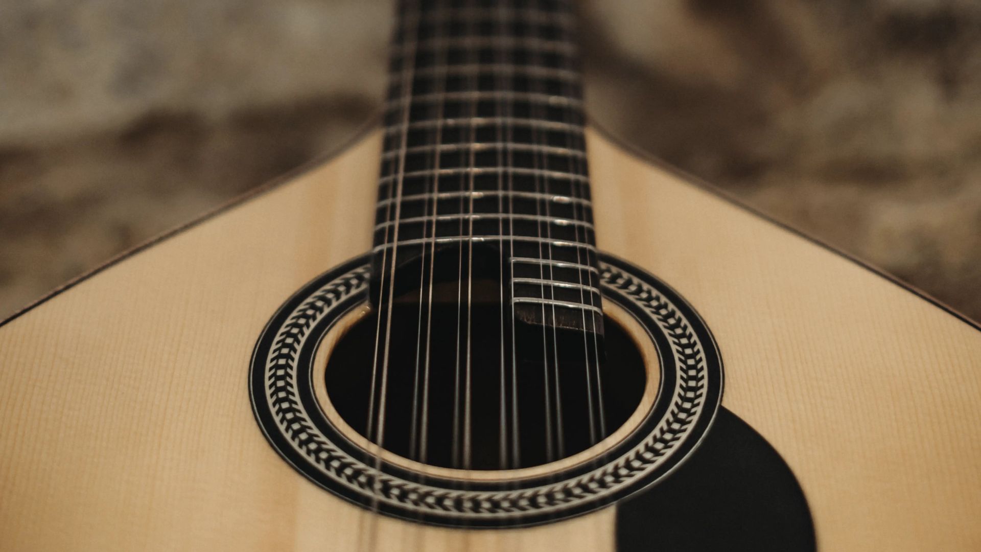 Close-up of a Portuguese guitar used in a live Fado performance in Porto