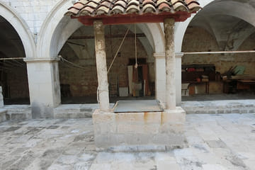 Dubrovnik Panorama Boat Tour with Franciscan Monastery Visit