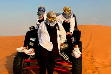 Experience Quad Bike, BBQ Dinner and Live Show in Dubai