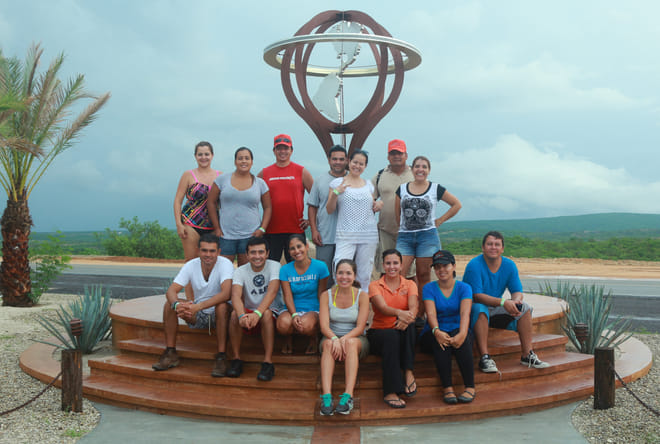 Group photo at the Santiago monument during a Baja California Sur adventure tour